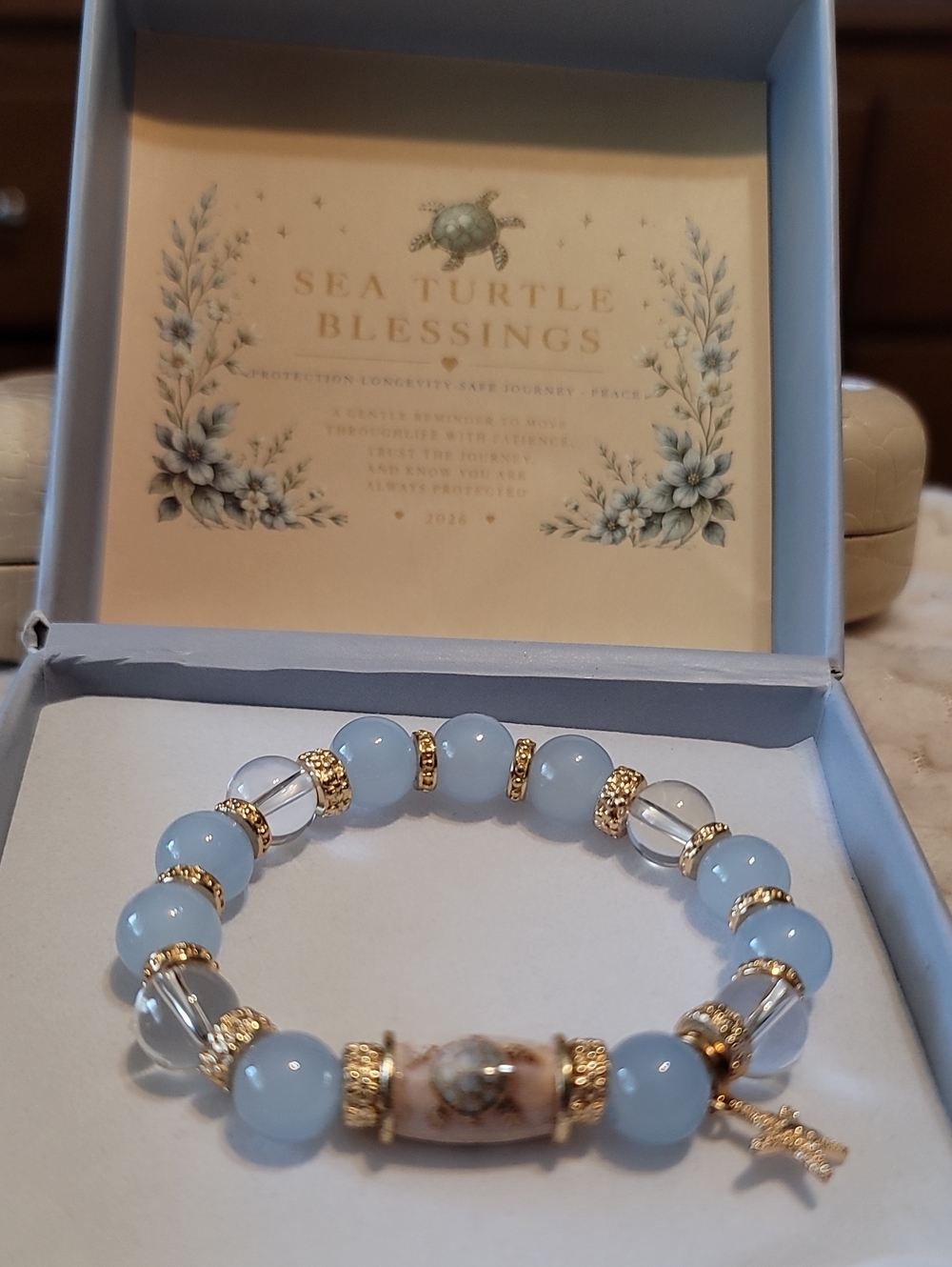 Sea Turtle, Light Blue Bead Stretch Bracelet with Gold Accents  With Box